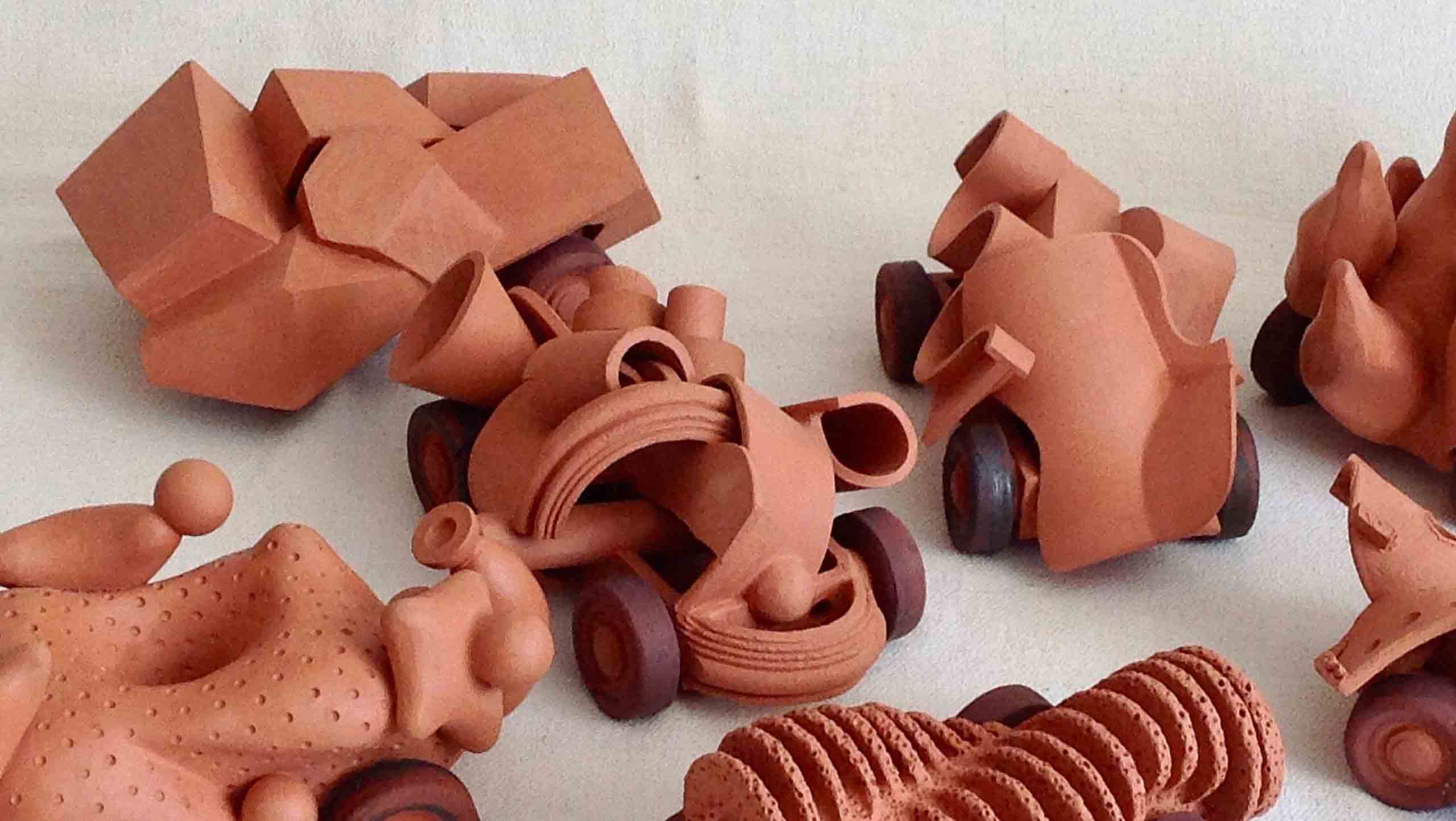 "Autobiography", a set of nine terra cotta vehicles each with their own characteristics such as: Fire, Biscuits, Boxes, Junkyard, Extrusions, Soft and round.