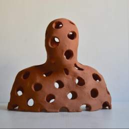 Enlightenment single terra-cotta figure. Unglazed earthenware made by contemporary ceramic artist Simon Fell