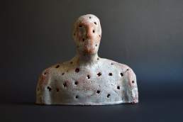 Enlightenment single figure. Earthenware terra-cotta glazed made by contemporary ceramic artist Simon Fell