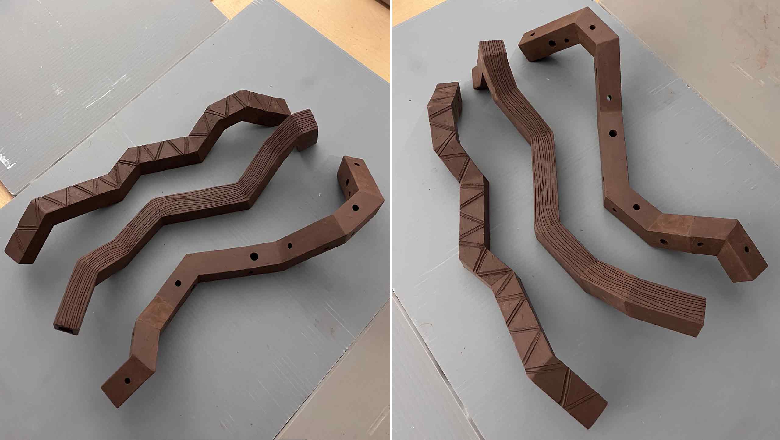 Three stick-like square-section artworks made of clay slabs. The works are made as if they were fashioned in wood but they are made of clay.