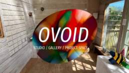 A view of Ovoid studio/Project space/gallery - with a large logo floating over the centre of the image