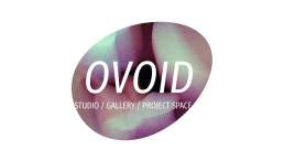 Ovoid logo variant 6 for Ovoid studio / project space / gallery in Ovingdean near Brighton. An egg shape angled at about 30 degrees with the word 'Ovoid' horizontally across the middle.