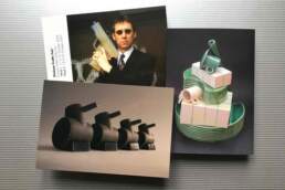 Postcards showing: 'Monument to the unknown potter', 'Tank Family' and 'Potgun 1' Ceramic sculptures by Simon Fell, postcards from the archive
